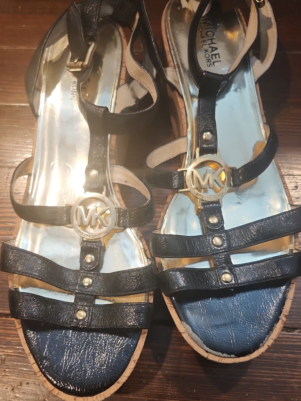 MICHAEL Michael Kors Black Leather MK Logo T-Strap Sandals with Gold Accent